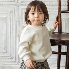 バックラメリボンニットソートップス